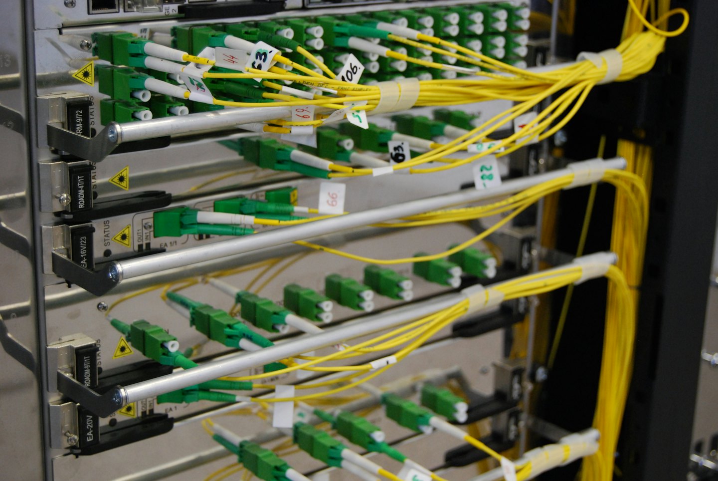 Fiber optic cables and server hardware in a data rack.